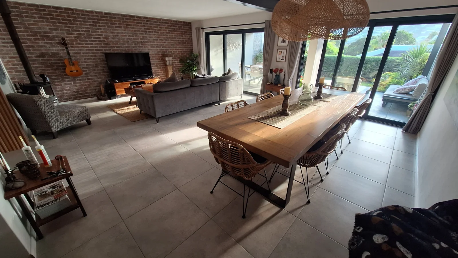 Large format floor tiling in open plan living and dining area