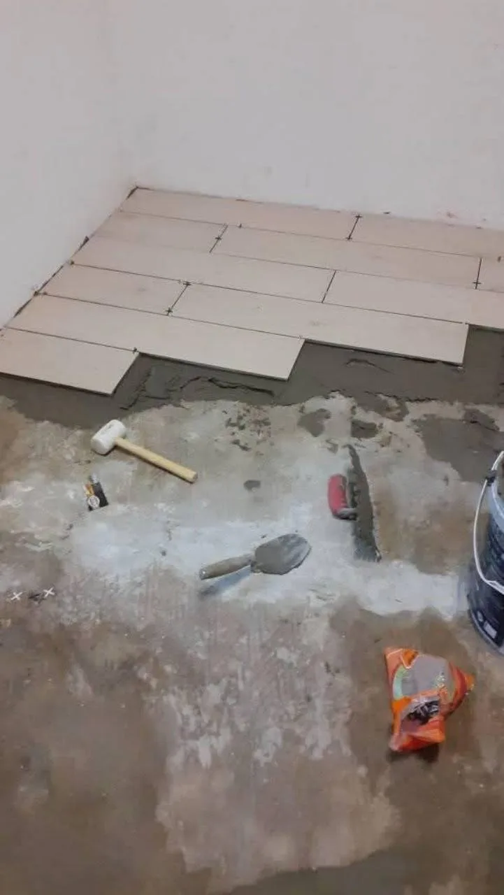 Tile removal and floor preparation before new tiling